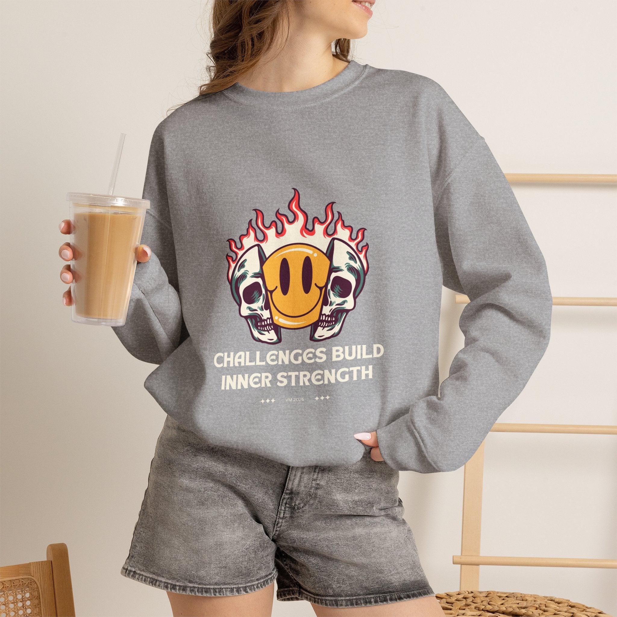Crewneck Sweatshirt — “Challenges Build Inner Strength” Flame Smile Graphic